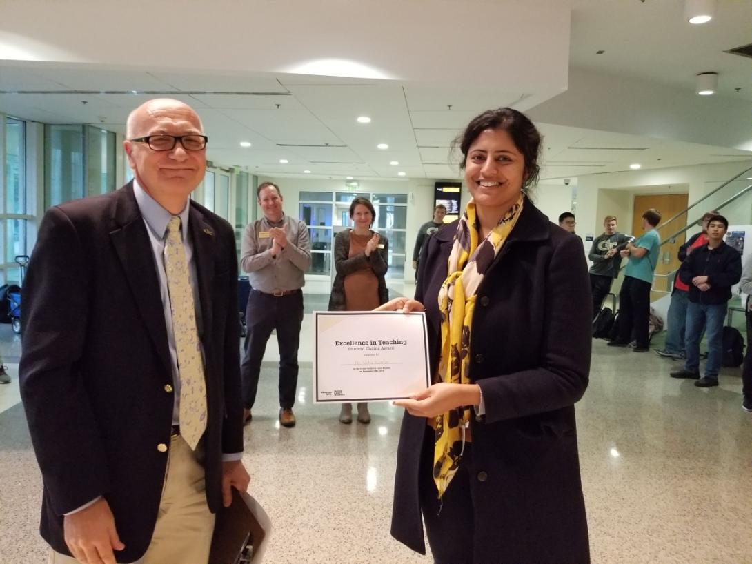 Vice Provost Potts with Student Choice Award Winner, Dr. Neha Kumar